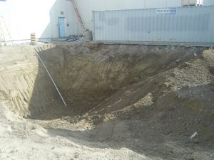 Digging out new location for new commercial oil tank